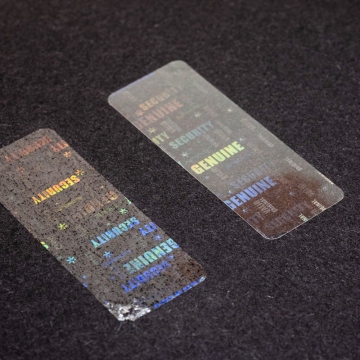 Transparentný pečatiacej film so skrytým hologramom štítky 45x17 mm